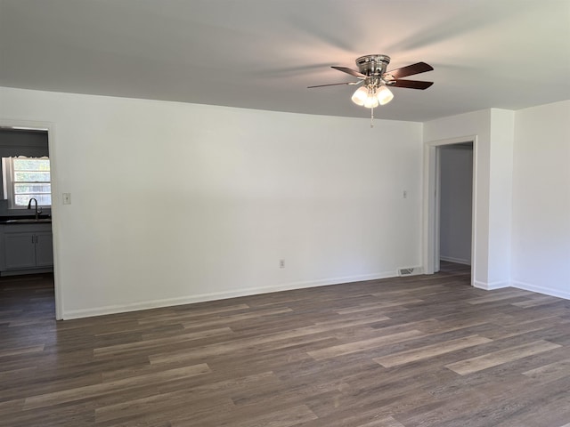213 Loring St, Spartanburg, SC 29302 - empty room with ceiling fan and dark wood finished floors