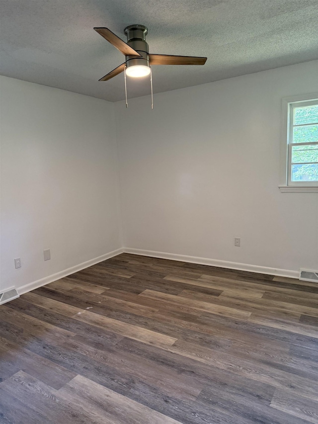 213 Loring St, Spartanburg, SC 29302 - empty room with ceiling fan, dark wood-style flooring, and a textured ceiling