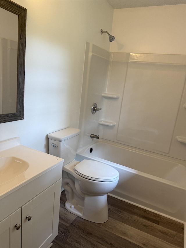 213 Loring St, Spartanburg, SC 29302 - full bath with wood finished floors, vanity, and shower / washtub combination