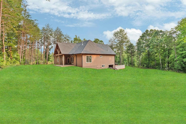 122 Belue Mill Rd, Landrum, SC 29356 - back of house featuring a yard, a patio, and a shingled roof