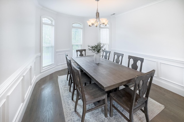 740 N Alamosa Dr, Boiling Springs, SC 29316 - dining area with a decorative wall, a chandelier, wainscoting, dark wood-style flooring, and crown molding