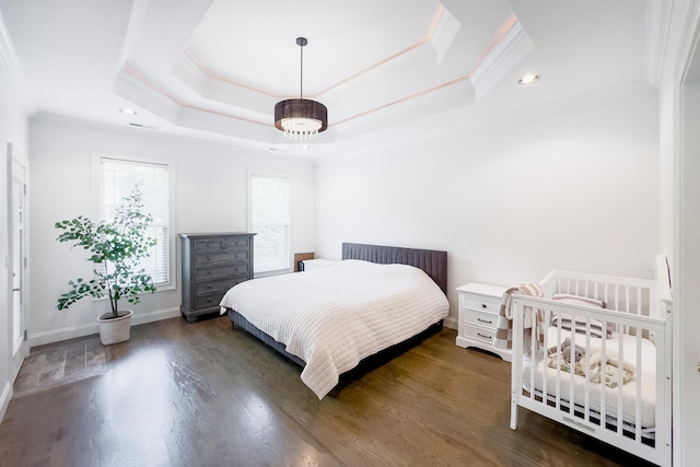 740 N Alamosa Dr, Boiling Springs, SC 29316 - bedroom with ornamental molding, a tray ceiling, wood finished floors, and recessed lighting