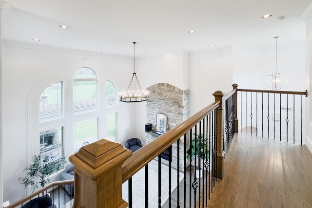 740 N Alamosa Dr, Boiling Springs, SC 29316 - hall featuring a chandelier, an upstairs landing, wood finished floors, crown molding, and recessed lighting