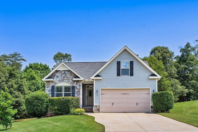 30 Caperton Way, Greer, SC 29651 - traditional home with stone siding, a front yard, driveway, a garage, and roof with shingles