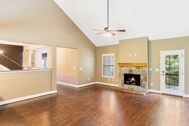 30 Caperton Way, Greer, SC 29651 - unfurnished living room featuring high vaulted ceiling, a ceiling fan, wood finished floors, a fireplace, and stairs