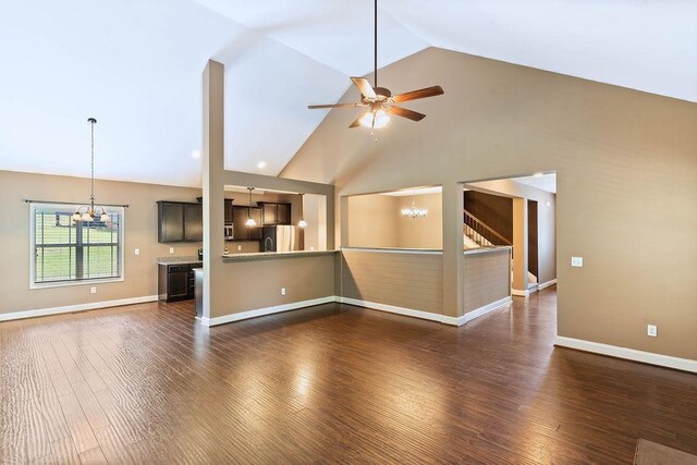 30 Caperton Way, Greer, SC 29651 - unfurnished living room featuring a chandelier, high vaulted ceiling, dark wood-style flooring, and a ceiling fan