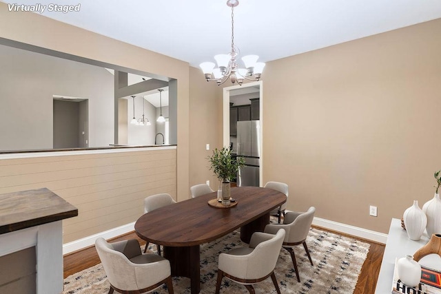 30 Caperton Way, Greer, SC 29651 - dining area featuring a chandelier and wood finished floors
