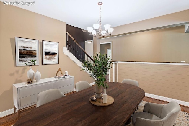 30 Caperton Way, Greer, SC 29651 - dining space featuring wood finished floors, a chandelier, and stairs