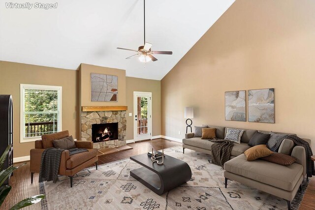 30 Caperton Way, Greer, SC 29651 - living room with ceiling fan, wood finished floors, high vaulted ceiling, and a stone fireplace