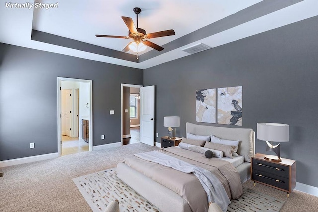30 Caperton Way, Greer, SC 29651 - bedroom with light colored carpet, a tray ceiling, and ceiling fan