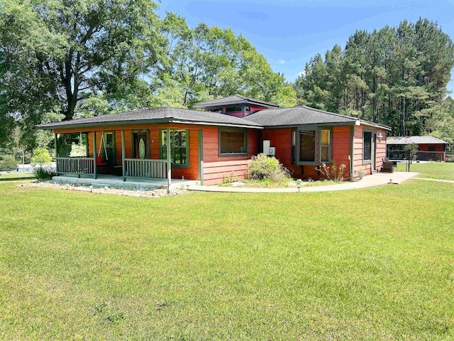 355 Blue Ridge Rd, Campobello, SC 29322 - view of front of house featuring a porch, a front yard, and roof with shingles