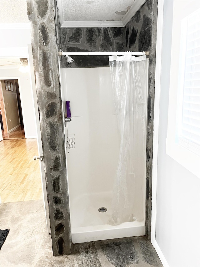 355 Blue Ridge Rd, Campobello, SC 29322 - full bathroom featuring a stall shower, ornamental molding, a textured ceiling, and wood finished floors