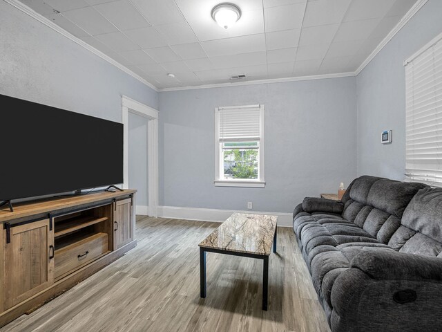 24 Oak St, Spartanburg, SC 29306 - living area with light wood finished floors and crown molding