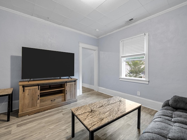 24 Oak St, Spartanburg, SC 29306 - living room featuring light wood-type flooring and ornamental molding