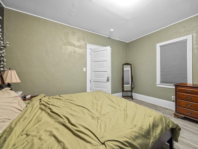 24 Oak St, Spartanburg, SC 29306 - bedroom featuring wood finished floors and baseboards