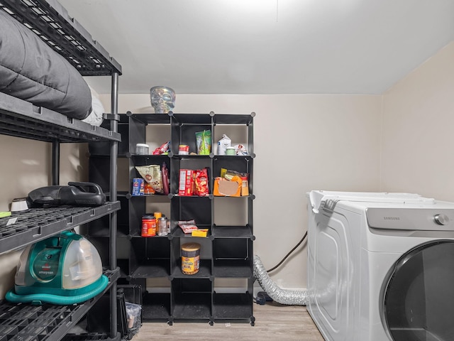 24 Oak St, Spartanburg, SC 29306 - laundry area featuring washer / clothes dryer and wood finished floors