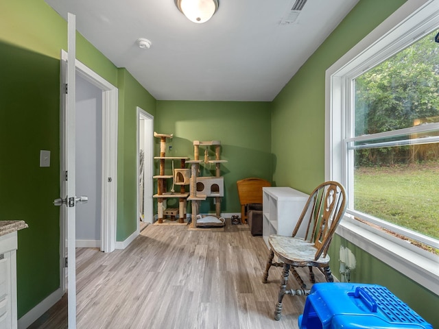 24 Oak St, Spartanburg, SC 29306 - living area with wood finished floors and baseboards
