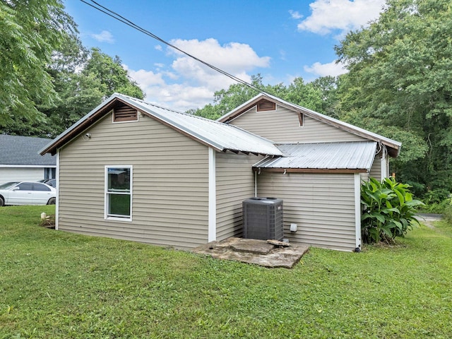 24 Oak St, Spartanburg, SC 29306 - view of side of property with a yard and a metal roof