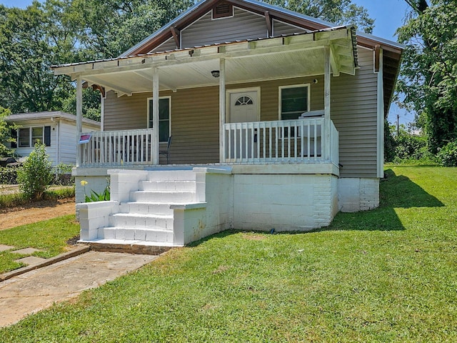 24 Oak St, Spartanburg, SC 29306 - bungalow-style home featuring a porch and a front lawn