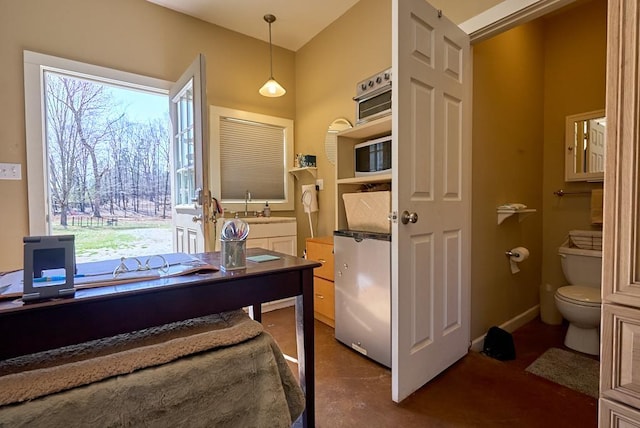 226 John Smith Rd, Columbus, NC 28722 - office space with concrete floors and a sink