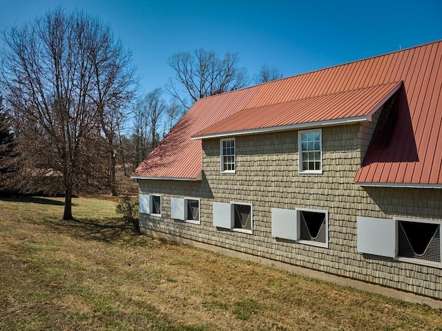 226 John Smith Rd, Columbus, NC 28722 - view of property exterior with a lawn and a metal roof