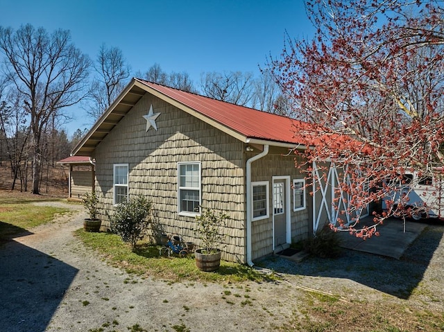 226 John Smith Rd, Columbus, NC 28722 - view of home's exterior with a metal roof
