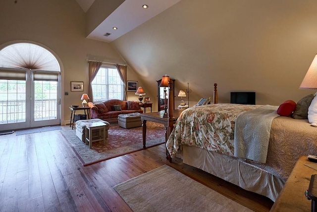 226 John Smith Rd, Columbus, NC 28722 - bedroom with vaulted ceiling, access to exterior, hardwood / wood-style flooring, and recessed lighting