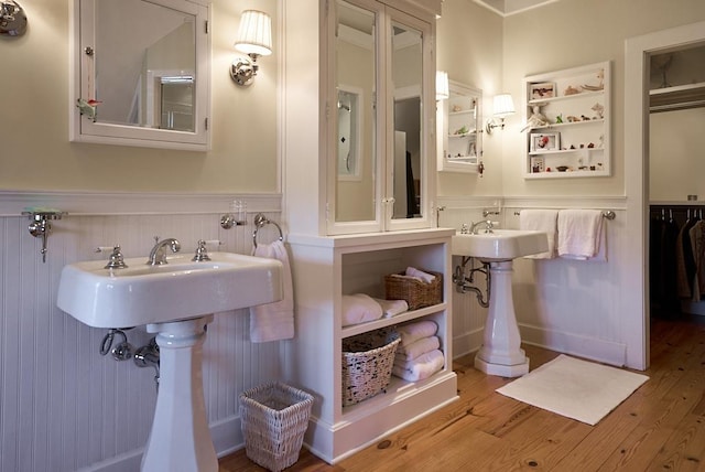 226 John Smith Rd, Columbus, NC 28722 - bathroom with a wainscoted wall and wood finished floors