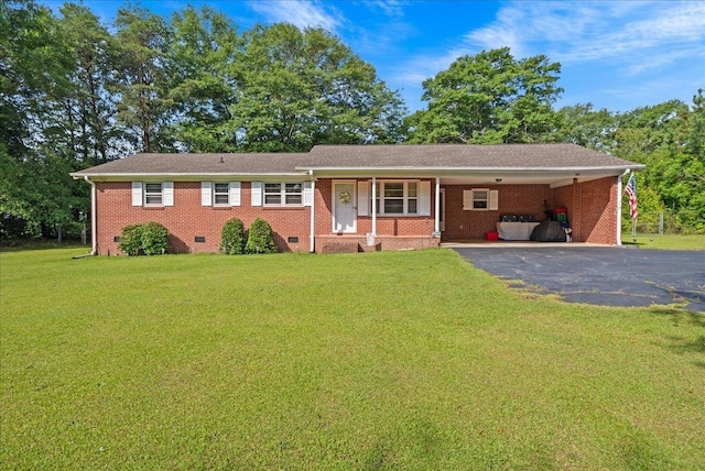195 Seigle Dr, Inman, SC 29349 - ranch-style home featuring driveway, a front yard, a carport, and brick siding