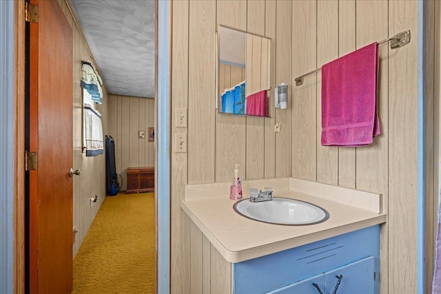 195 Seigle Dr, Inman, SC 29349 - bathroom with vanity, wood walls, and a textured ceiling