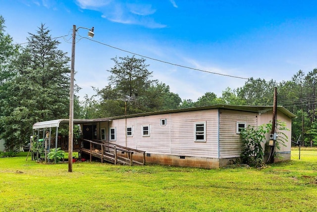 1751 Dillard Rd, Waterloo, SC 29384 - back of property with a yard and crawl space