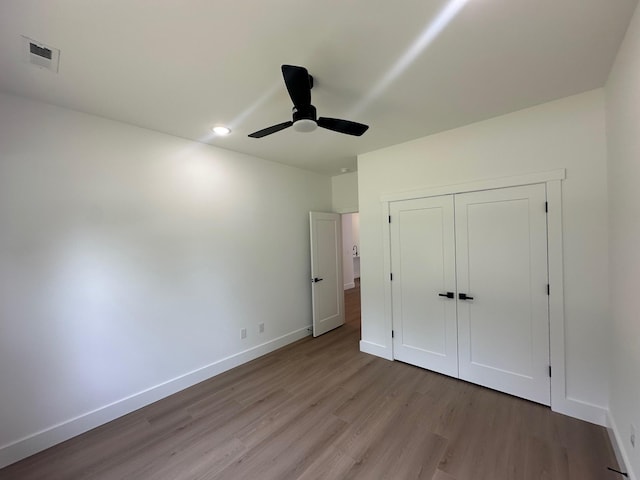953 Mike Cir, Boiling Springs, SC 29303 - unfurnished bedroom featuring wood finished floors, a closet, a ceiling fan, and recessed lighting