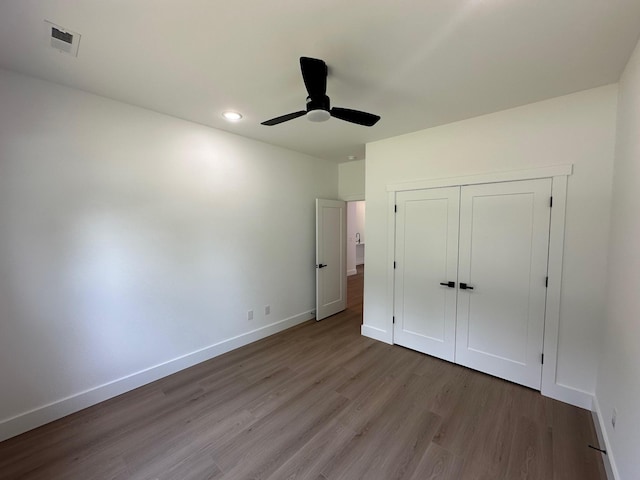 953 Mike Cir, Boiling Springs, SC 29303 - unfurnished bedroom featuring wood finished floors, a closet, a ceiling fan, and recessed lighting