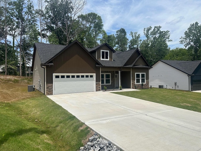 953 Mike Cir, Boiling Springs, SC 29303 - craftsman inspired home featuring stone siding, an attached garage, a front lawn, and a shingled roof