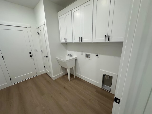 953 Mike Cir, Boiling Springs, SC 29303 - laundry area featuring cabinet space, hookup for an electric dryer, wood finished floors, and washer hookup