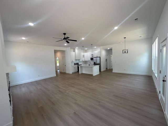 953 Mike Cir, Boiling Springs, SC 29303 - unfurnished living room featuring ceiling fan, wood finished floors, and recessed lighting
