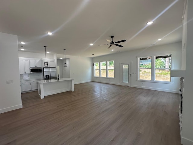 953 Mike Cir, Boiling Springs, SC 29303 - unfurnished living room featuring ceiling fan, wood finished floors, and recessed lighting