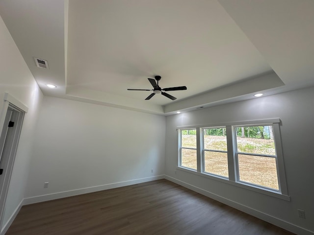 953 Mike Cir, Boiling Springs, SC 29303 - empty room featuring a tray ceiling, dark wood-style flooring, ceiling fan, and recessed lighting
