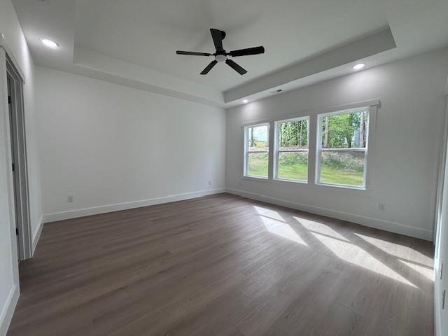 953 Mike Cir, Boiling Springs, SC 29303 - spare room with a raised ceiling, wood finished floors, recessed lighting, and a ceiling fan