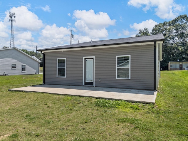 5 S Howard St, Inman, SC 29349 - rear view of house with a patio area and a lawn