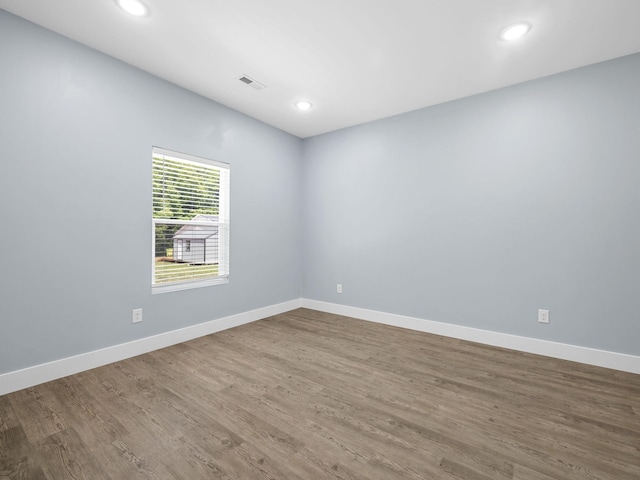 5 S Howard St, Inman, SC 29349 - spare room featuring wood finished floors and recessed lighting