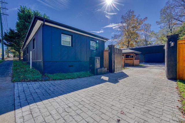 825 N Franklin Rd, Greenville, SC 29617 - view of front of house with board and batten siding and crawl space