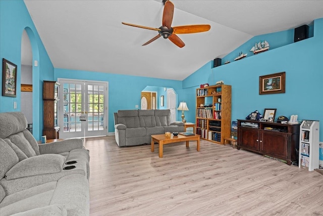 3881 New Cut Rd, Inman, SC 29349 - living area featuring wood finished floors, ceiling fan, french doors, arched walkways, and high vaulted ceiling