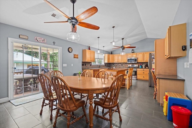 3881 New Cut Rd, Inman, SC 29349 - dining space with ceiling fan and lofted ceiling