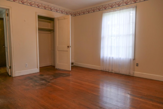 4421 New Cut Rd, Inman, SC 29349 - unfurnished bedroom with wood finished floors, multiple windows, and a closet
