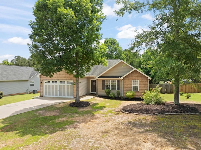 719 S Bomar Ave, Landrum, SC 29356 - view of front of home with concrete driveway and a garage