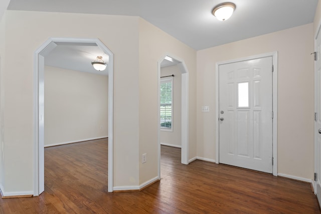 719 S Bomar Ave, Landrum, SC 29356 - foyer with arched walkways and wood finished floors