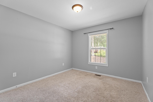 719 S Bomar Ave, Landrum, SC 29356 - carpeted spare room with baseboards