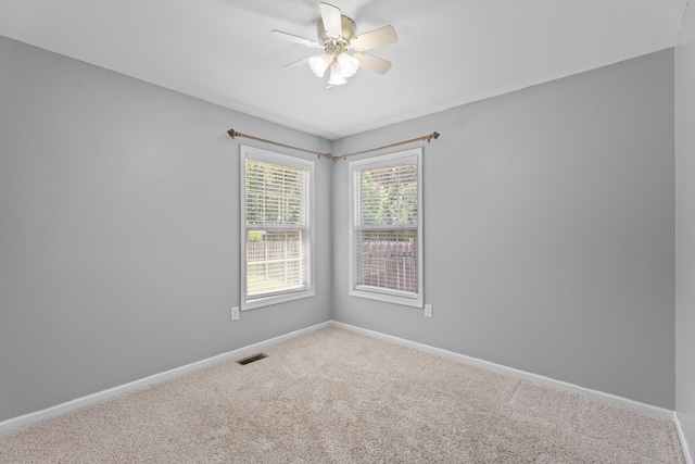 719 S Bomar Ave, Landrum, SC 29356 - spare room featuring carpet and a ceiling fan