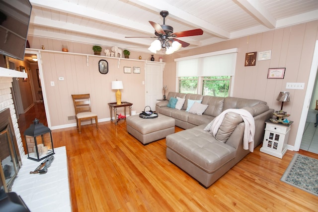 147 Hillbrook Dr, Spartanburg, SC 29307 - living area with a fireplace, light wood-type flooring, beamed ceiling, and ceiling fan